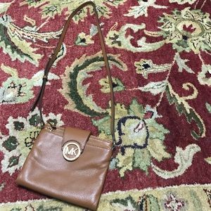 Michael Kors Cross body purse.